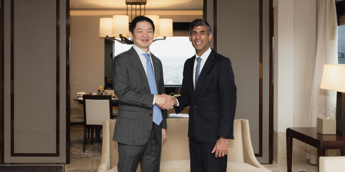 SK Networks President Sunghwan Choi encounters former UK Prime Minister