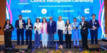 Minister K Shanmugam Presents AmCham CARES Awards to companies at the AmChamSG 53rd Annual General Meeting and Social Impact Fair